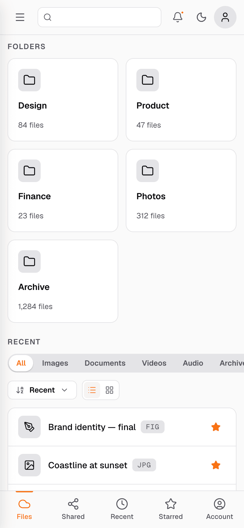 Cloude mobile Files screen. Top bar with hamburger, search field, notification bell with unread dot, theme toggle and avatar. Folder cards in a two-column grid for Design, Product, Finance, Photos, Archive. Recent strip with All, Images, Documents, Videos, Audio, Archives tabs. Recent files Brand identity and Coastline at sunset visible. Bottom tab bar with Files, Shared, Recent, Starred, Account.